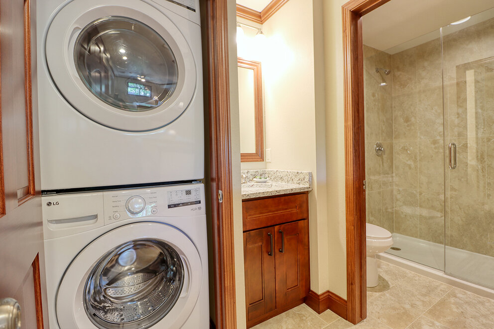 a washer and dryer in a bathroom