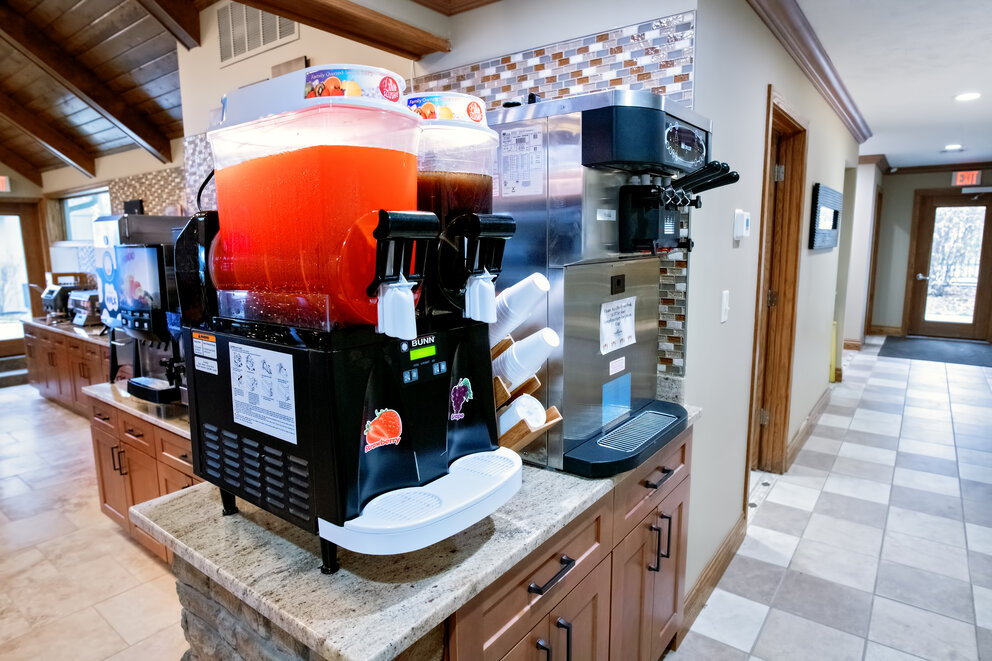 a machine with a drink dispenser