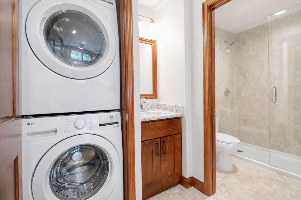a washer and dryer in a bathroom
