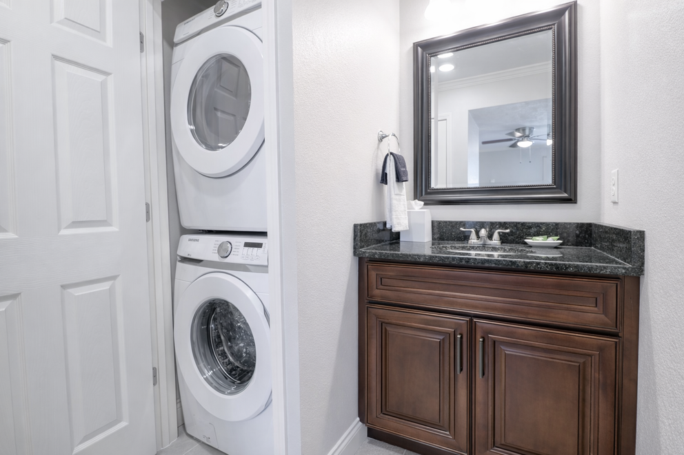 a washer and dryer in a bathroom