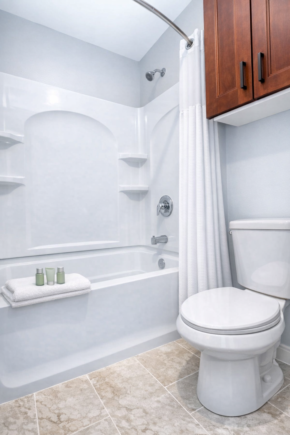 a bathroom with a toilet and bathtub